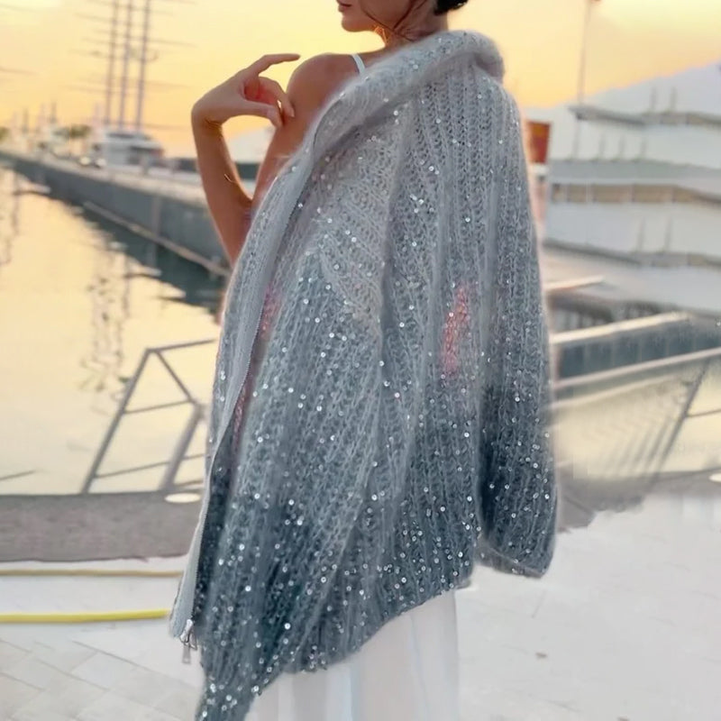 Yksivärinen paljettineulepusero