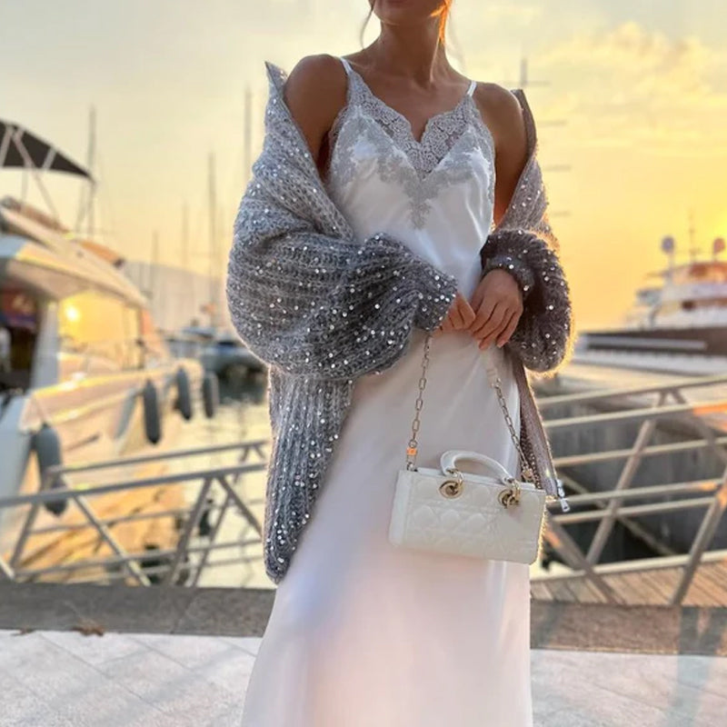 Yksivärinen paljettineulepusero